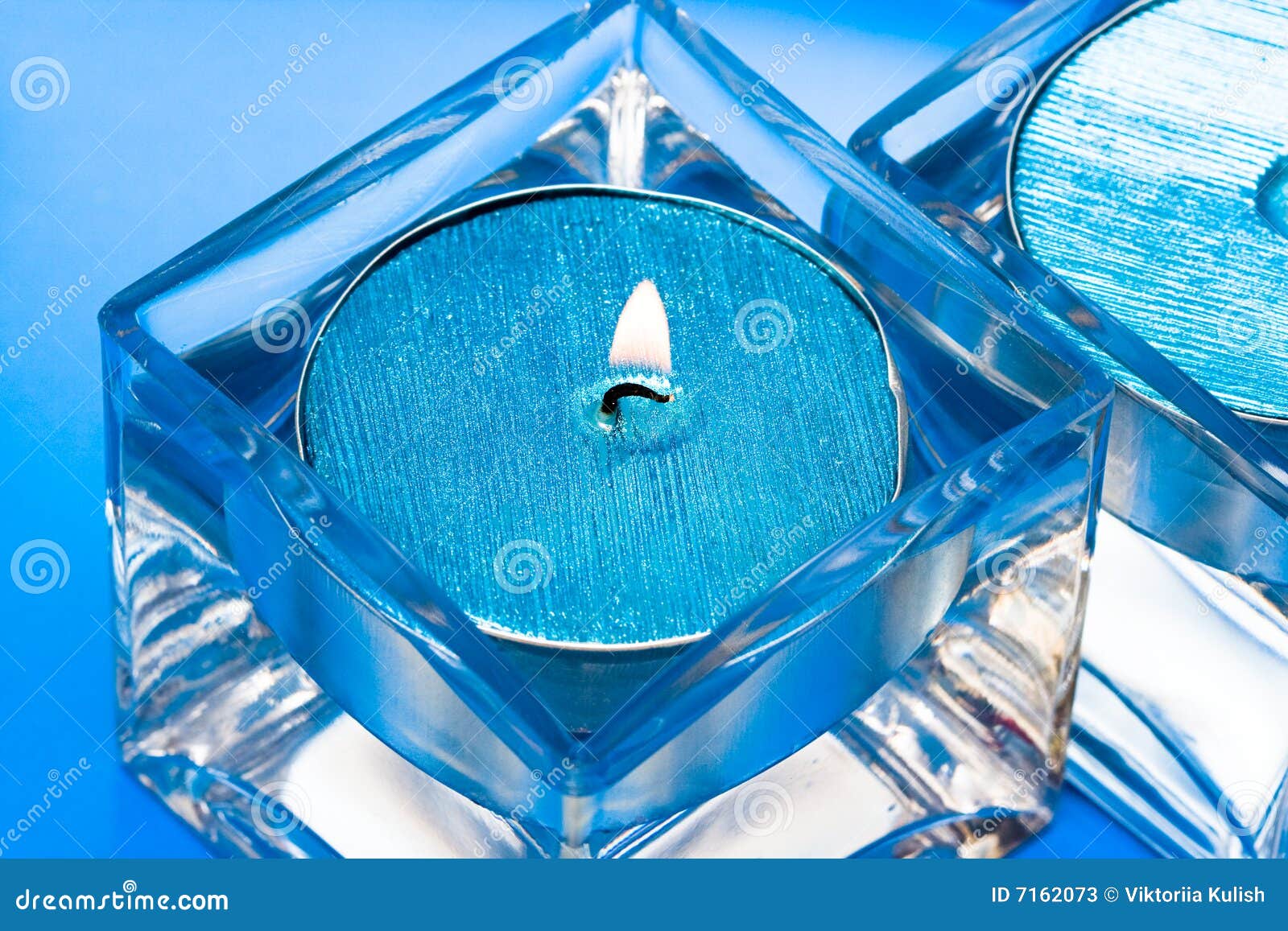 Blue candles in glass stock image. Image of fire, decoration 7162073