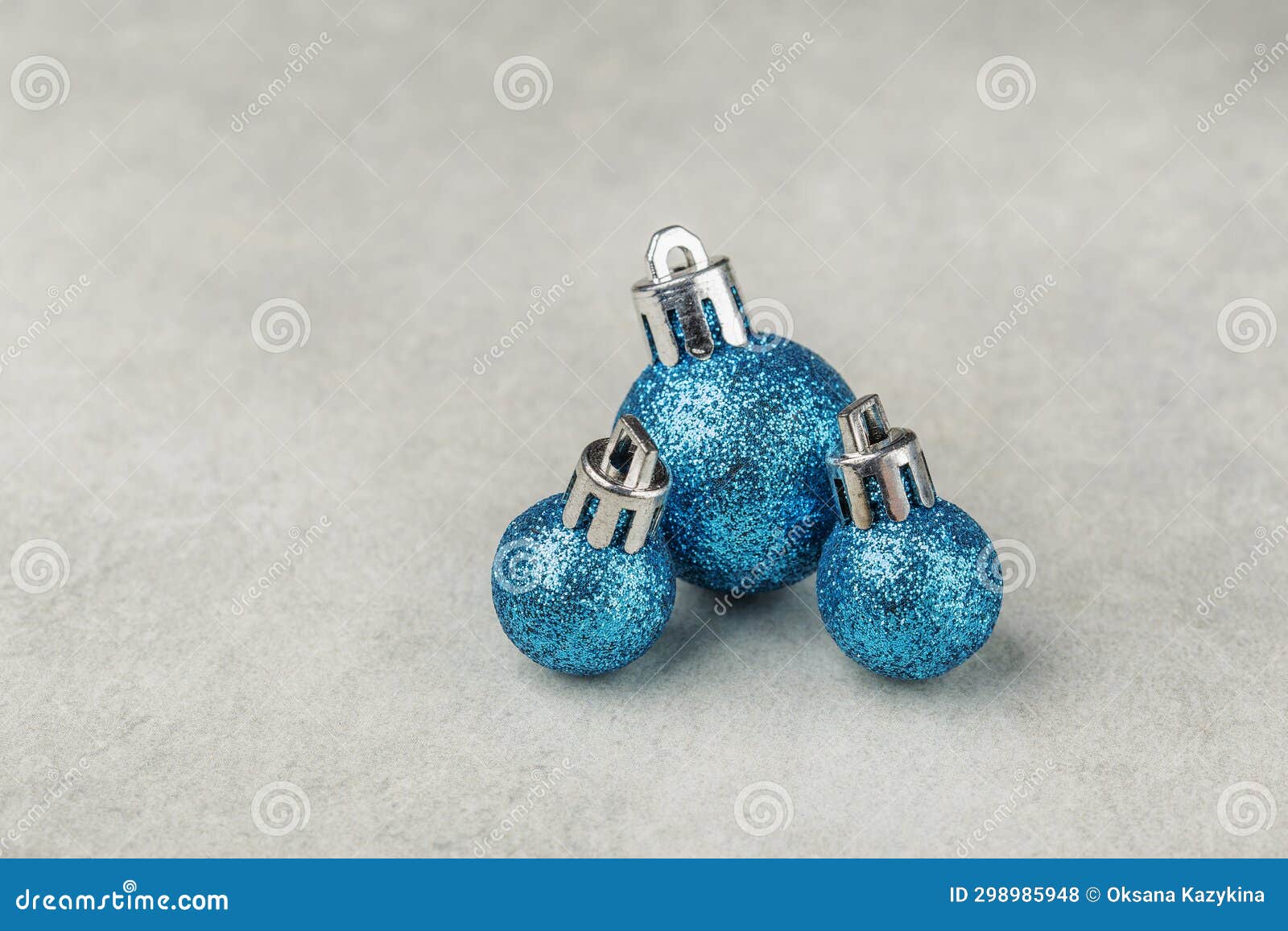 Blue Christmas Tree Balls Toys on a Light Background Stock Photo