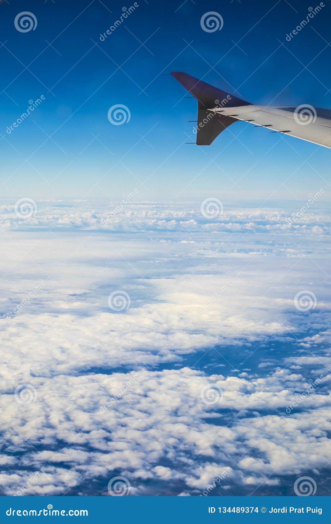 blue cloudscape from the sky window plane