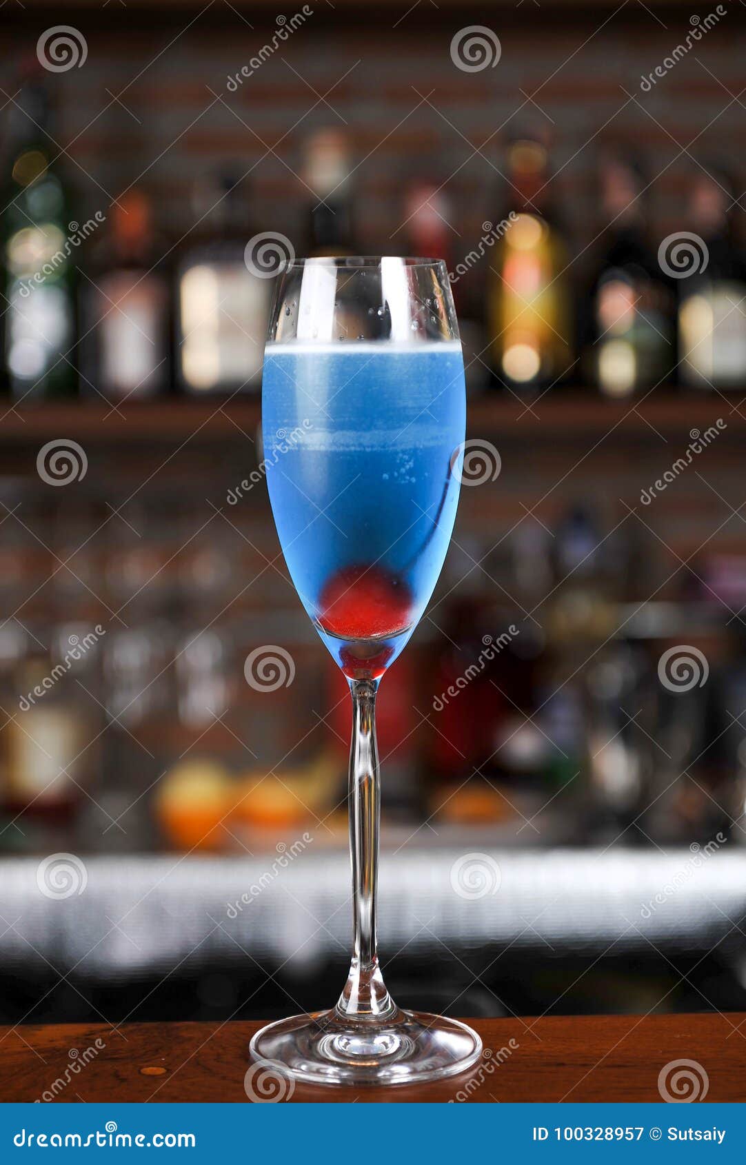 Blue cocktail and cherry stock image. Image of fruit 100328957