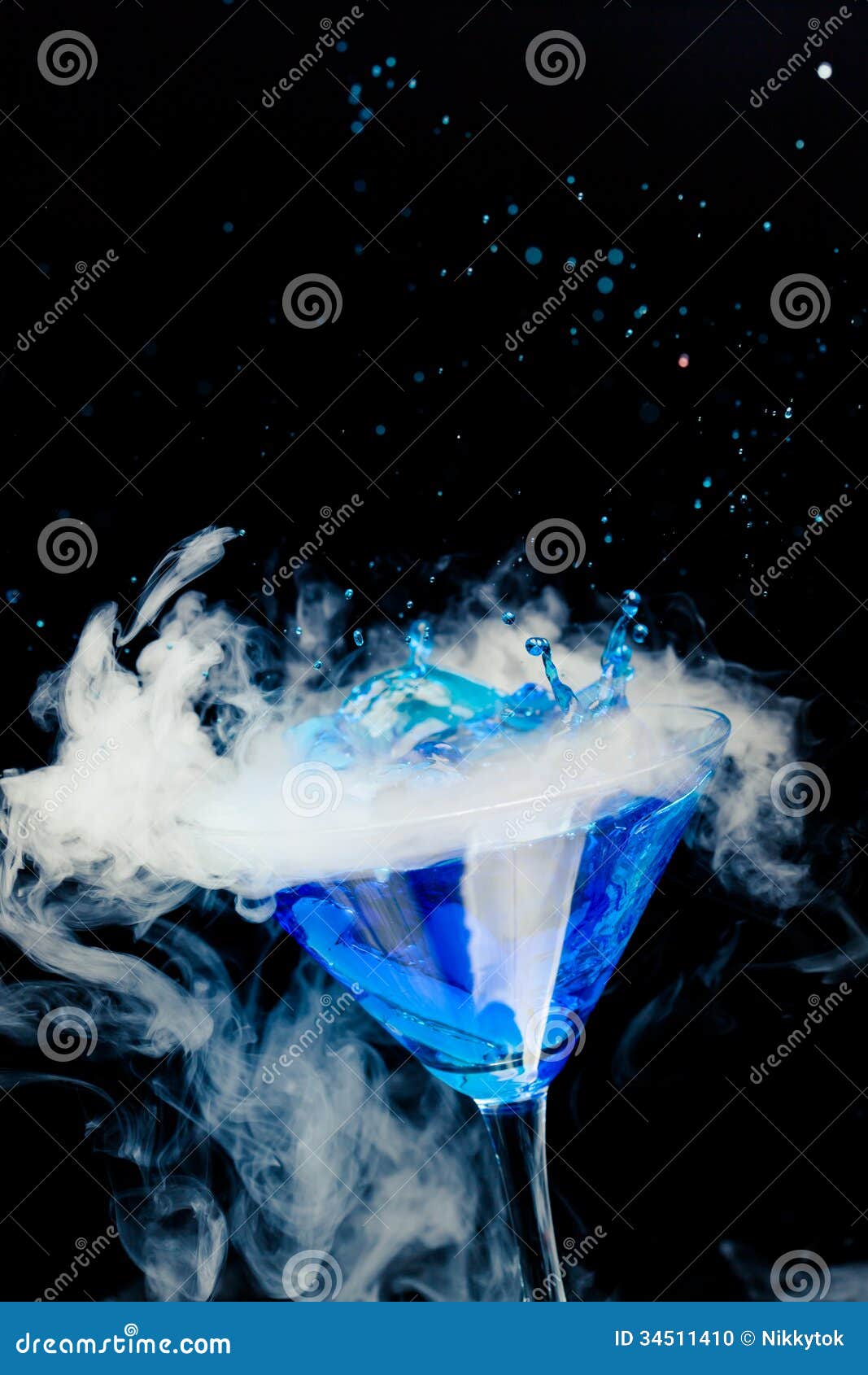 Blue cocktail with splash stock photo. Image of liquor - 34511410