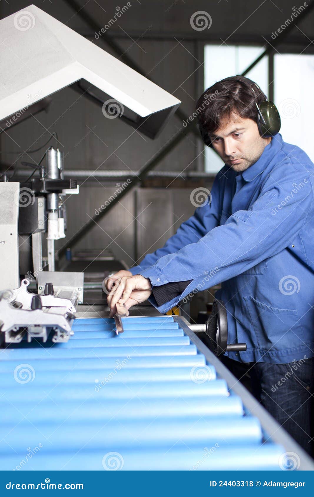 Bluecollar Working in Fabric Stock Photo Image of close