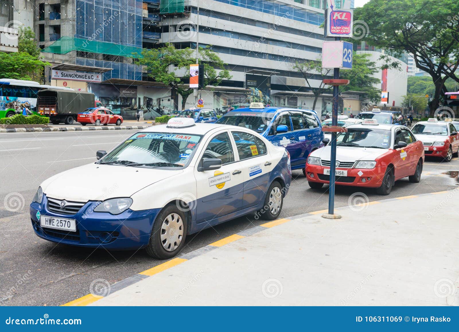 Blue Comfort and Red Econom Kuala Lumpur Taxi Cars Editorial Stock
