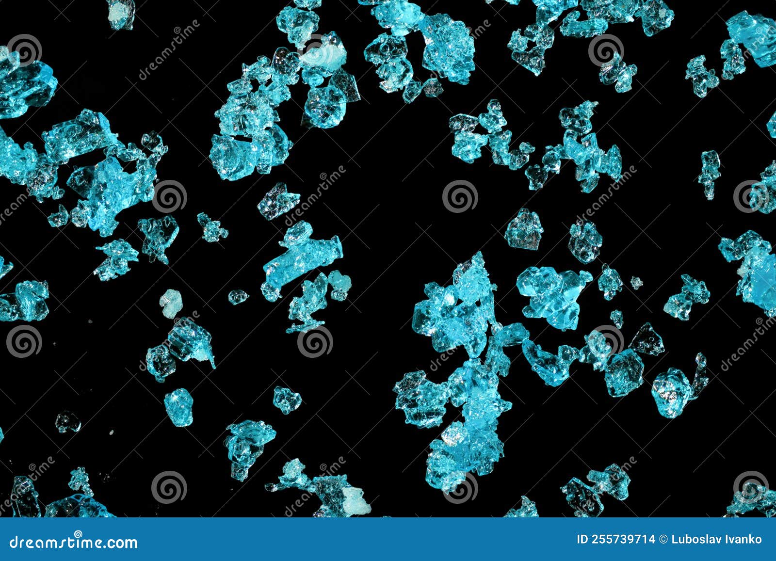 blue copper sulphate crystals under 4x microscope magnification image width 9mm.