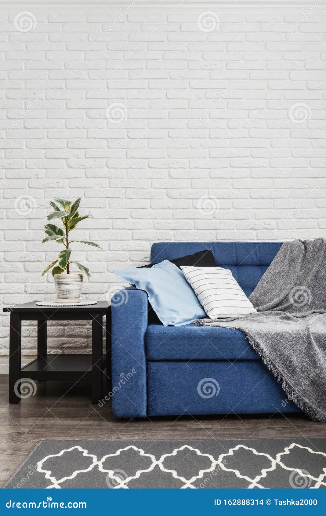 Blue Couch with Pillows and Grey Plaid Stock Photo Image of cozy