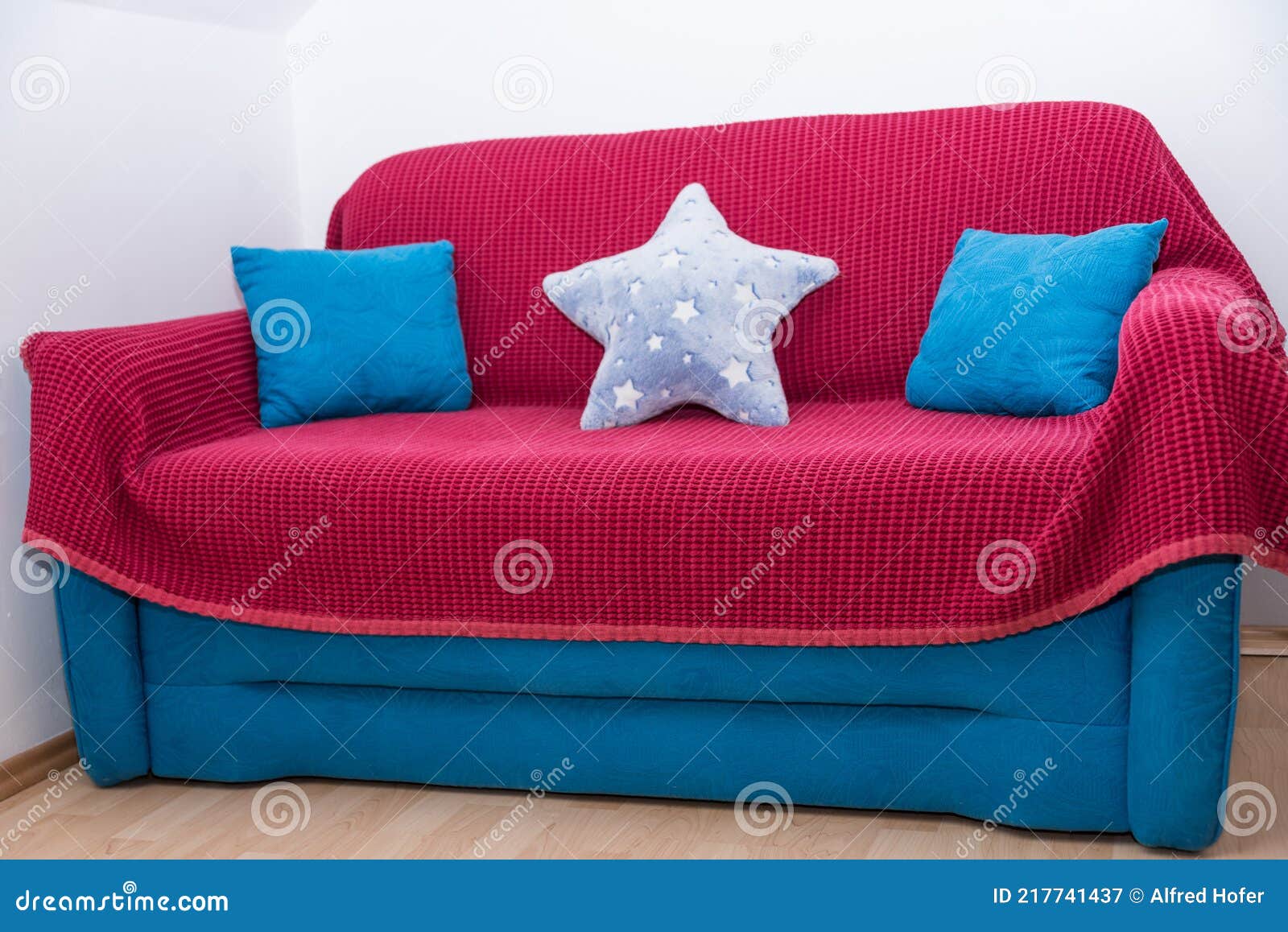 Blue couch with pillows stock image. Image of lounge 217741437