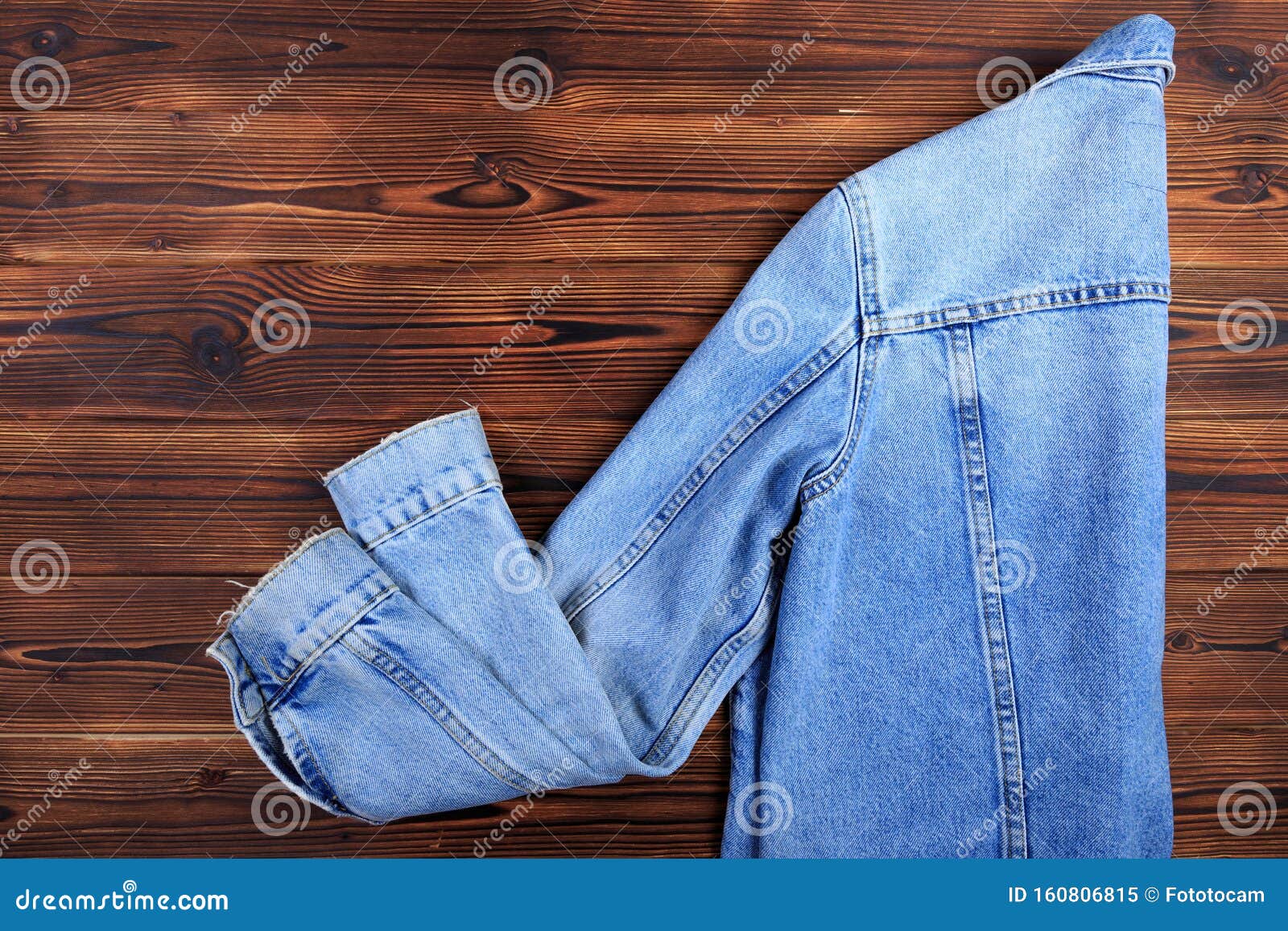 Blue Denim Jean Jacket on Wooden Background Stock Image - Image of ...