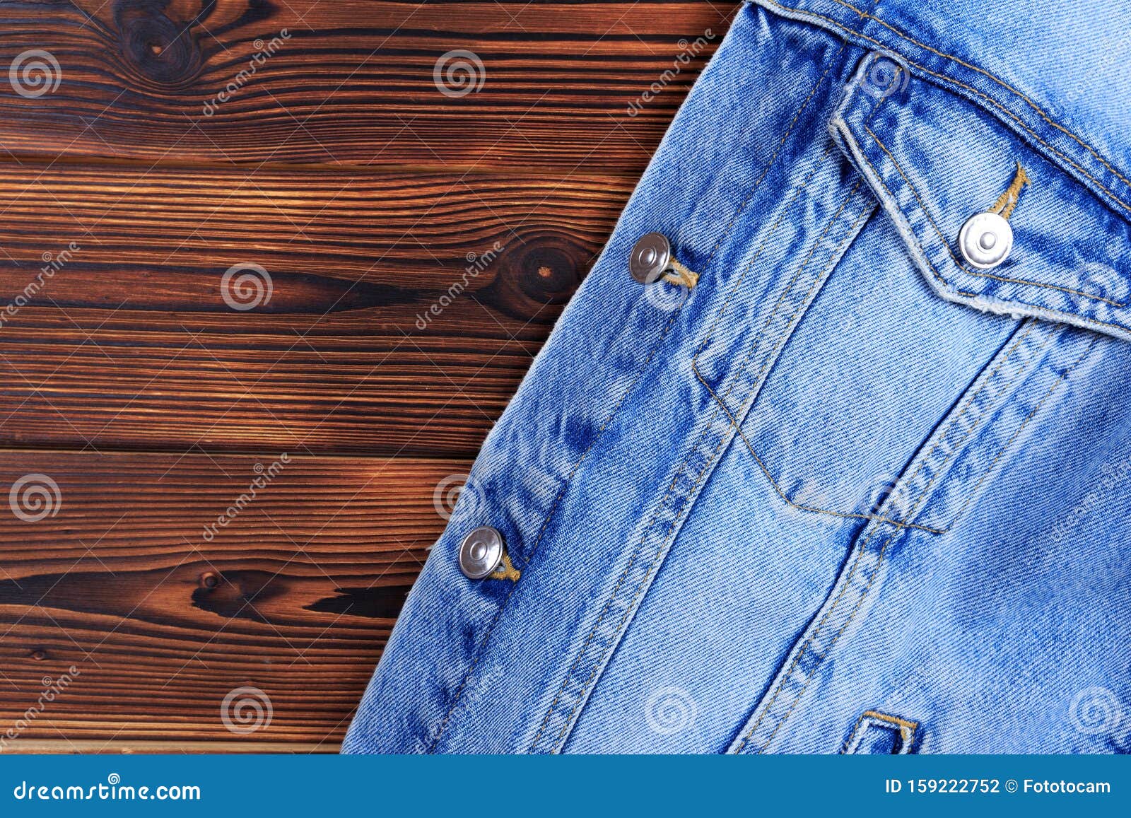 Blue Denim Jean Jacket on Wooden Background Stock Photo - Image of ...