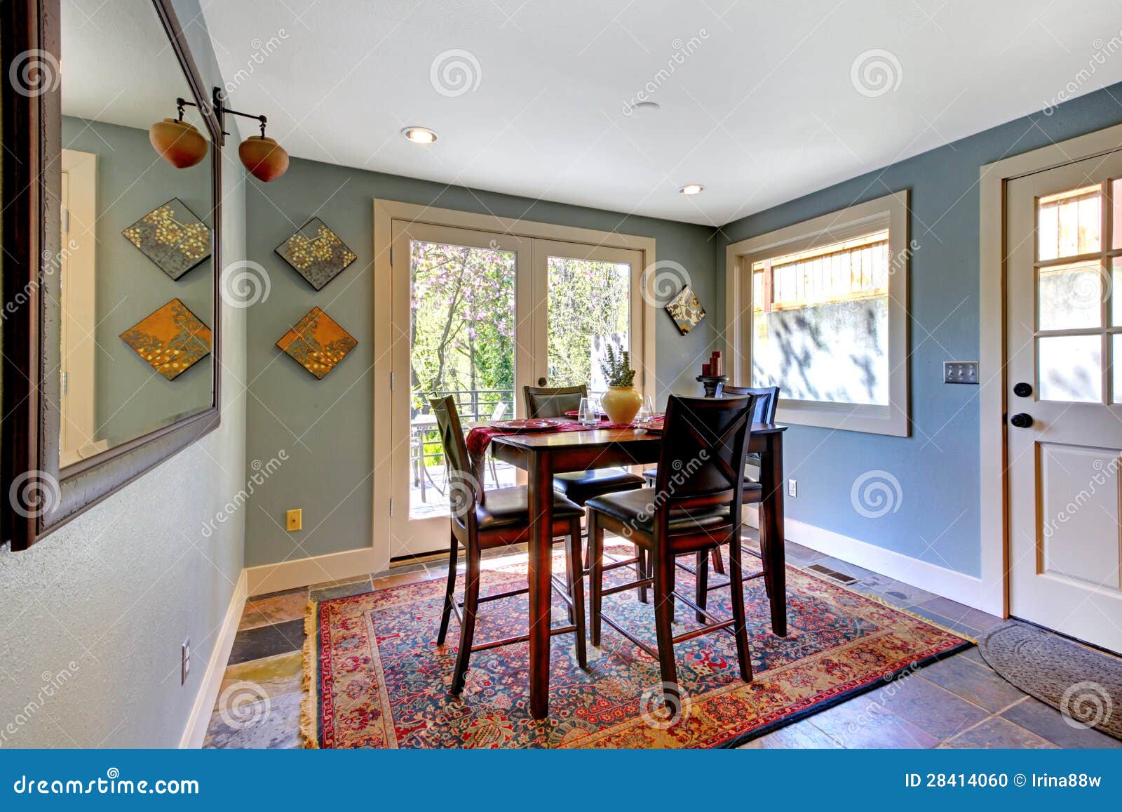 Blue Dining Room With Red Rug And High Table. Stock Photo ...