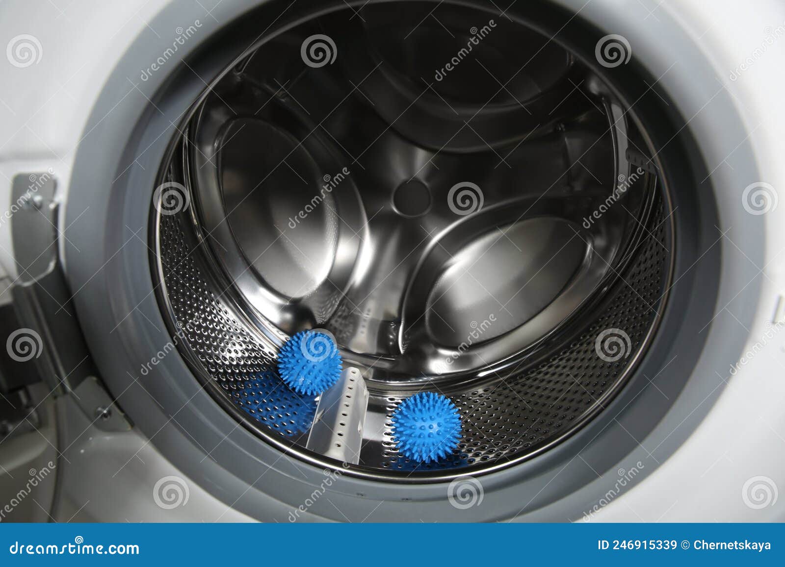 Blue Dryer Balls in Washing Machine Drum, Closeup Stock Image Image