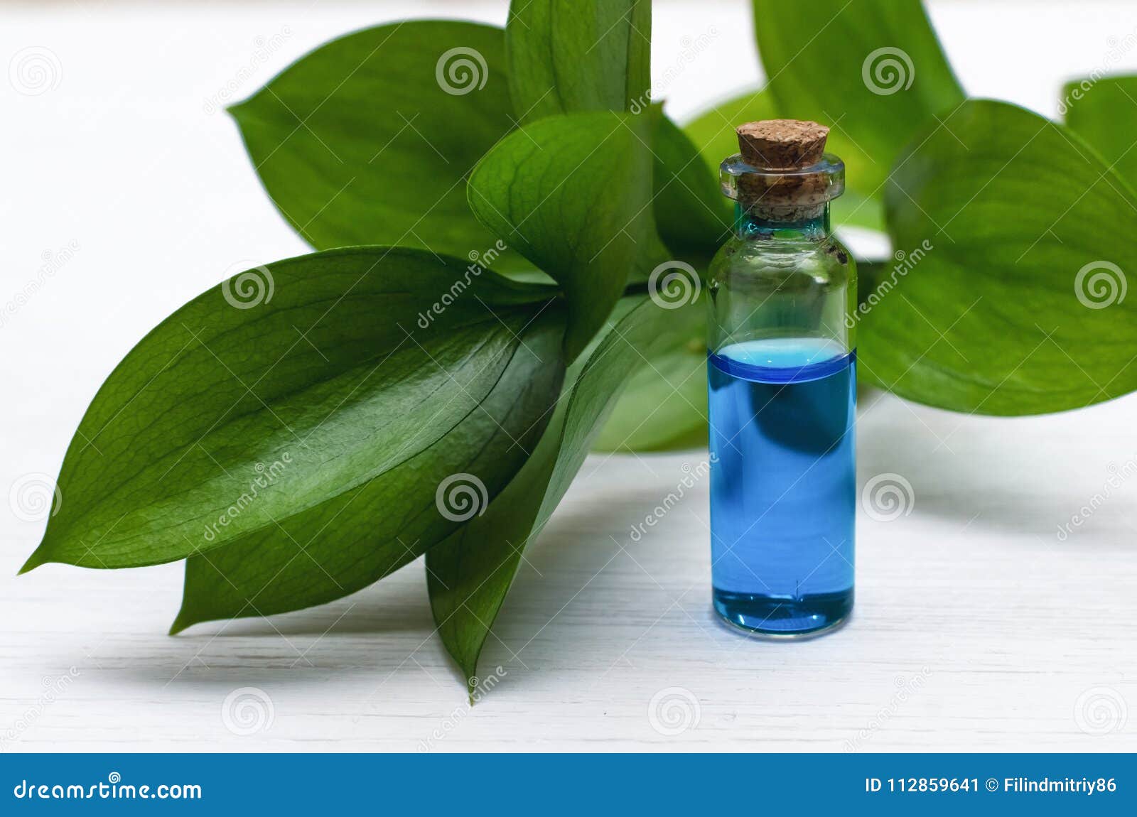 Blue Essence Healing Tincture on White Wooden Table Background ...