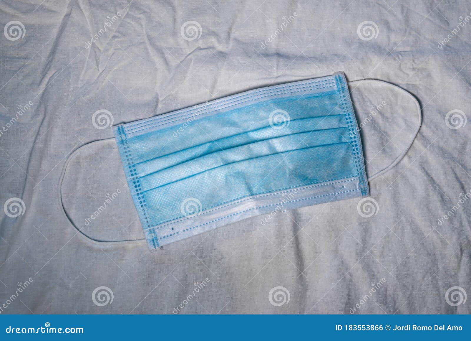 Blue Face Mask Against Viruses and Other Polluting Pathogens Stock