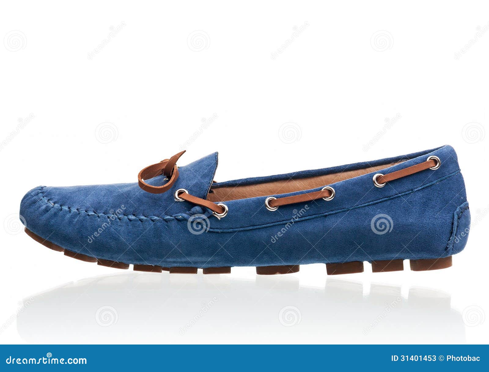 blue female loafer over white