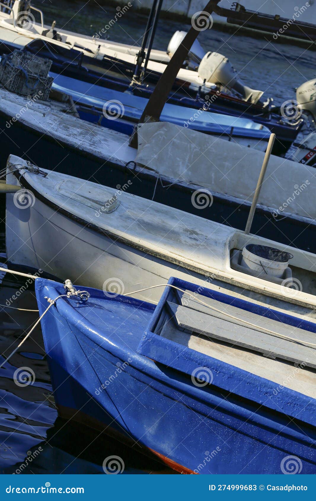 Blue Fishing Boat Over Dark Water. Ston, Croatia Stock Image