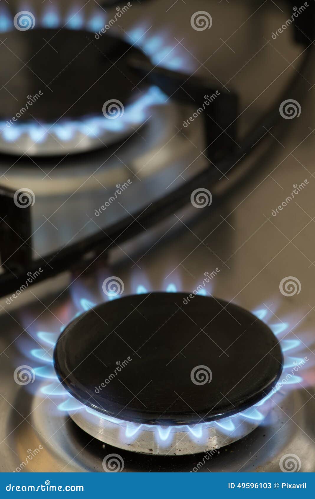 Blue flames of a gas stove stock image. Image of oven 49596103