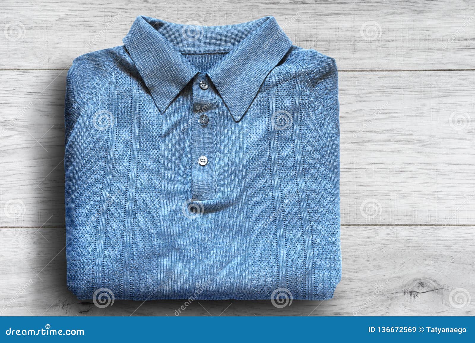 Shirt on wooden background stock image. Image of cotton - 136672569