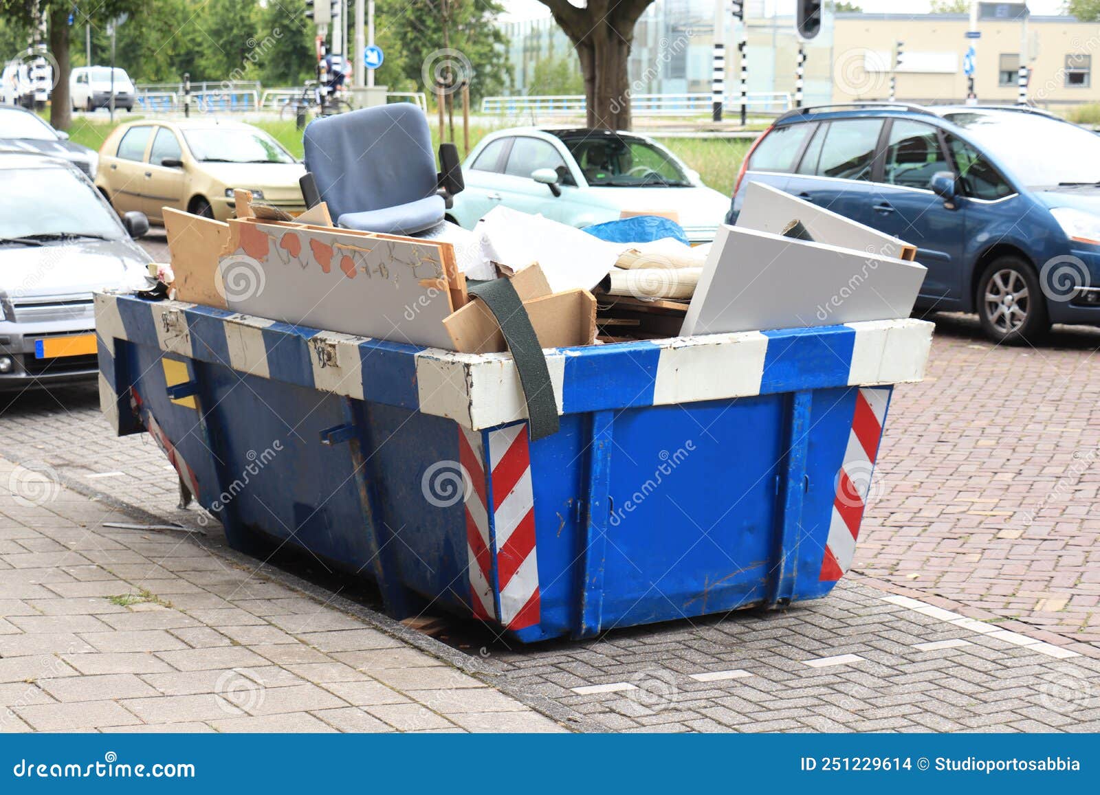 Blue Garbage Dumpster stock photo. Image of chute, household 251229614