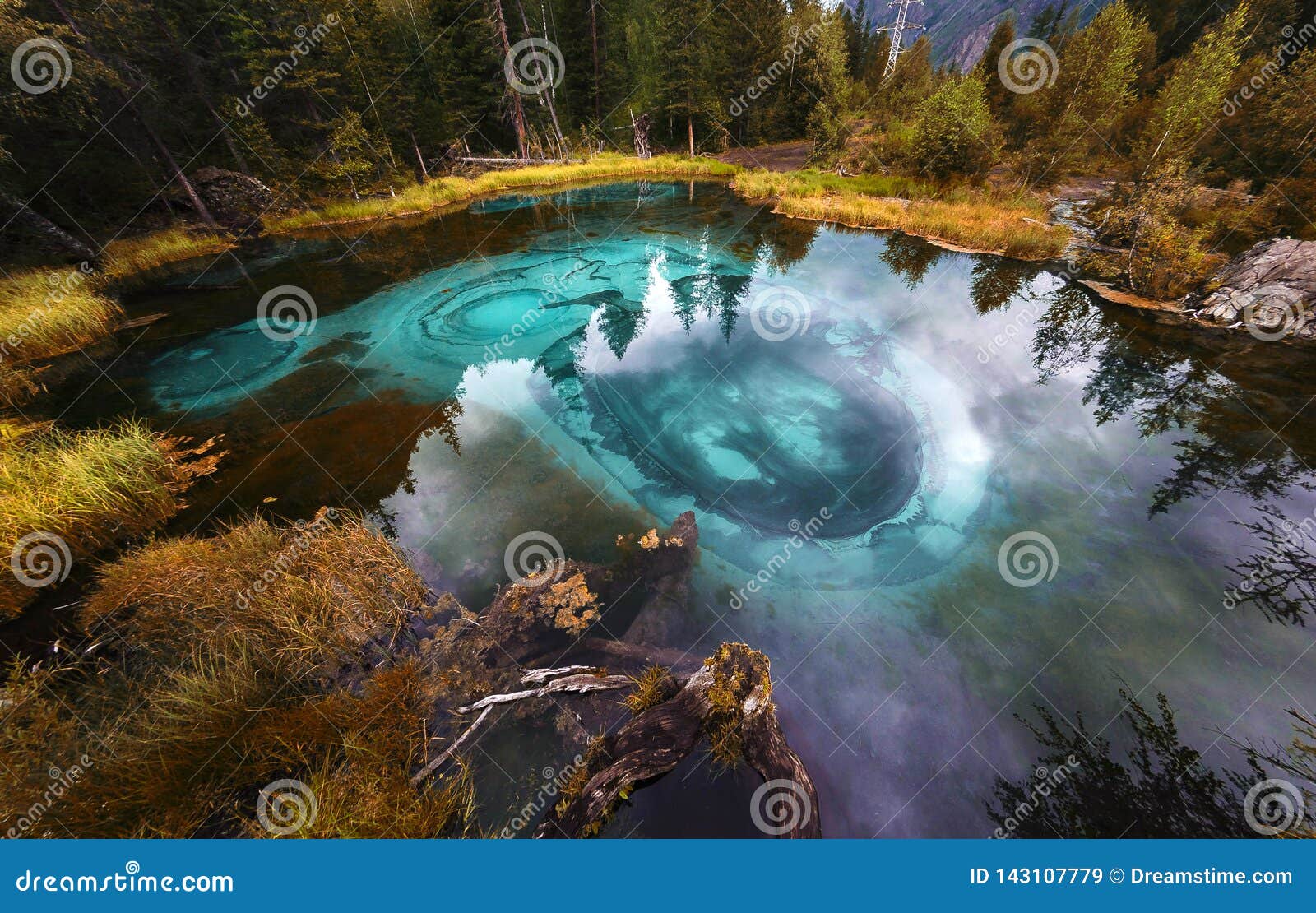 blue geyser lake in altai mountains, altai republic, siberia, russia