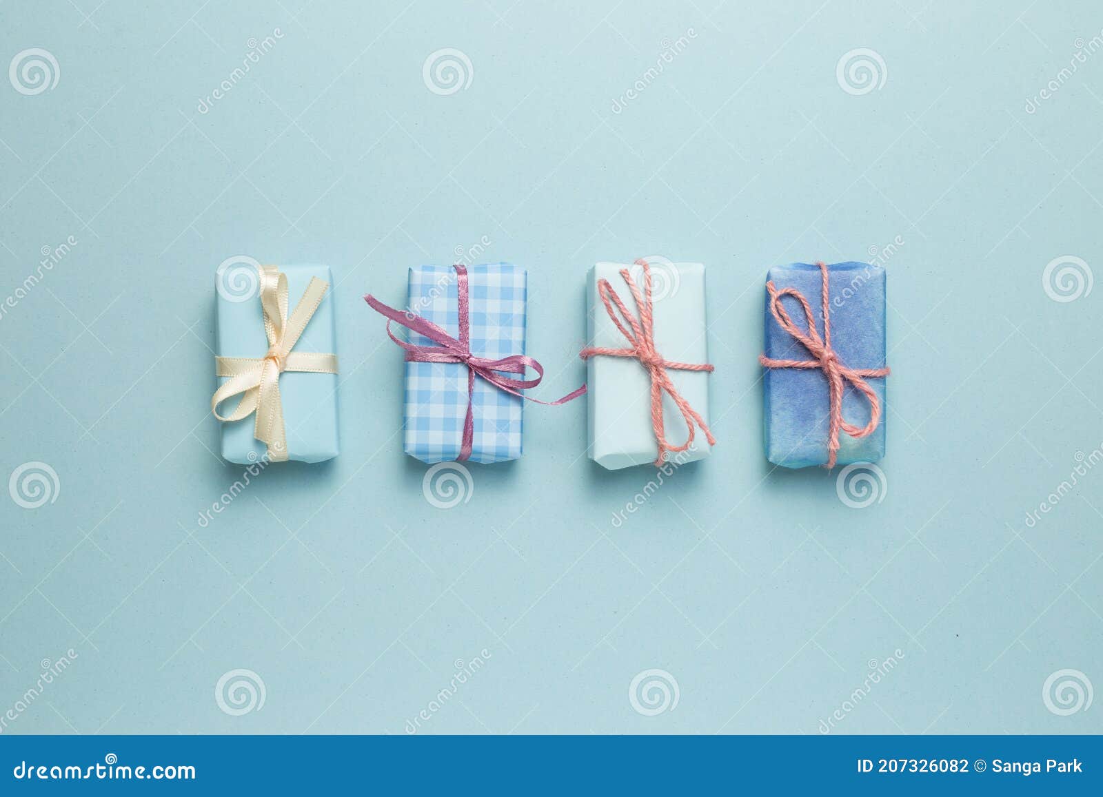 Blue Gift Boxes on Sky Blue Background Stock Photo Image of blue