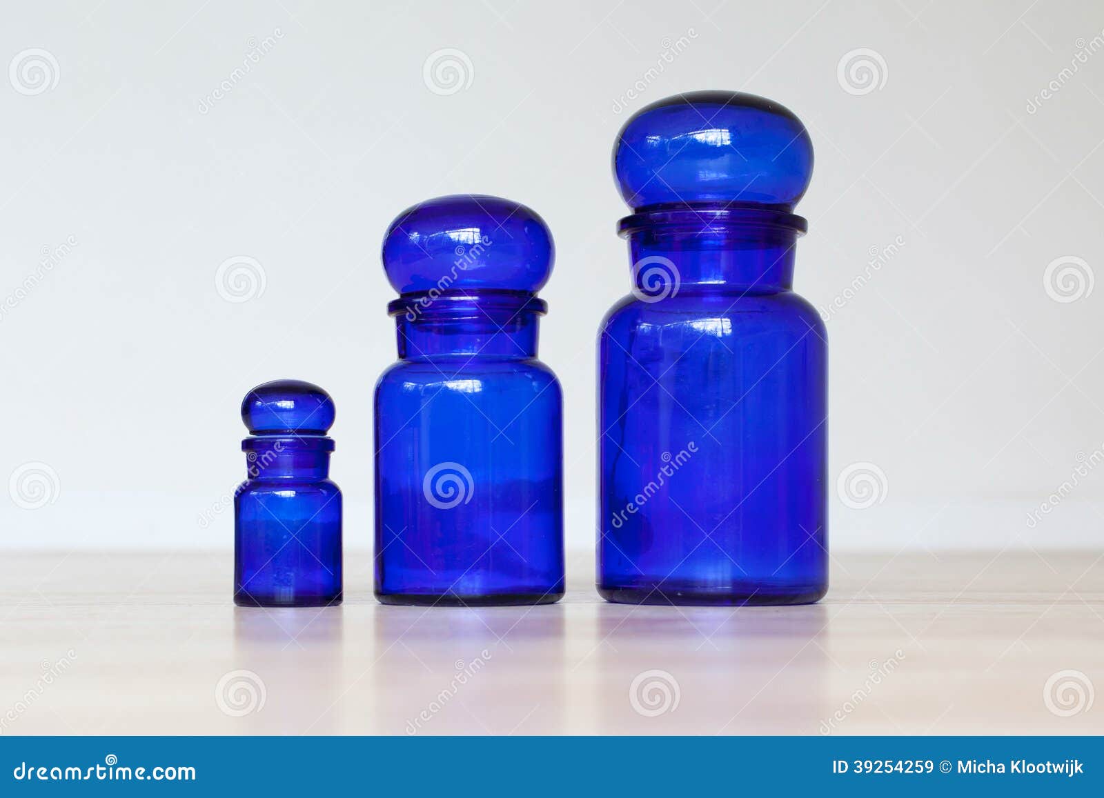 Blue glass jars stock image. Image of reflection, space - 39254259