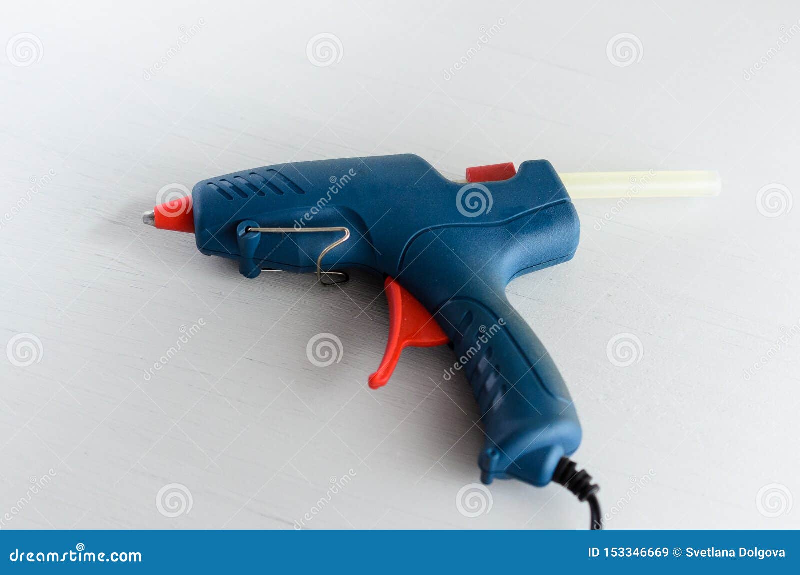 Blue Glue Gun and Hot Melt Rods on White Background Stock Image Image