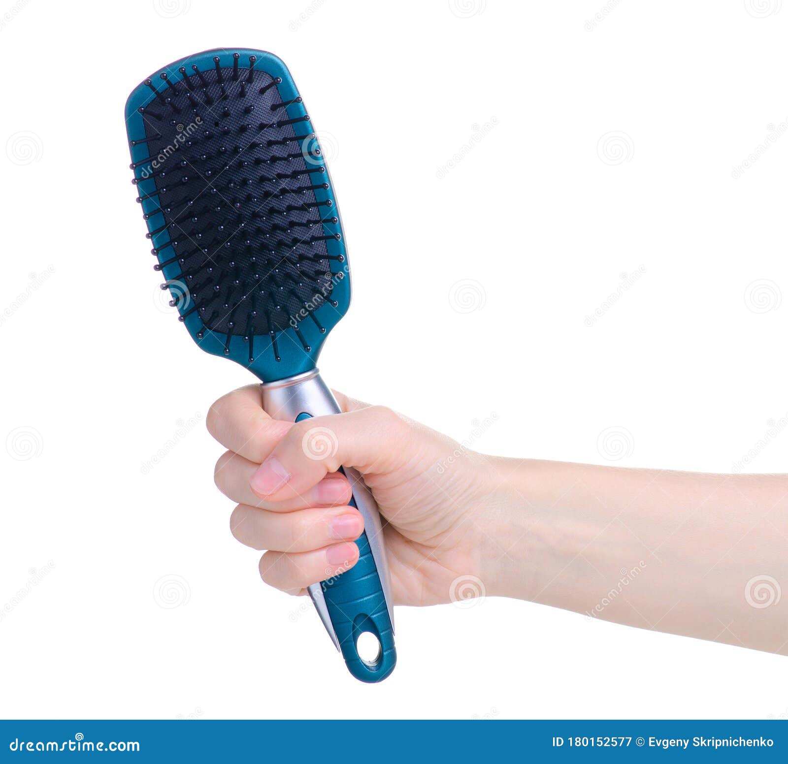 Blue hair brush in hand stock image. Image of accessory 180152577