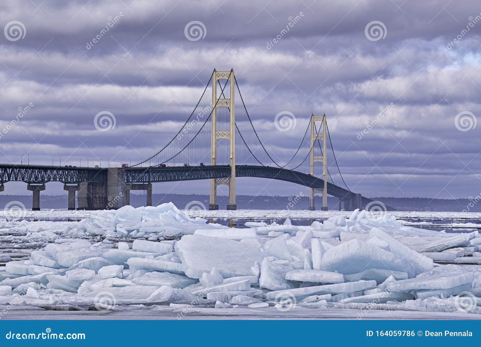 blue ice shards and mackinac bridge