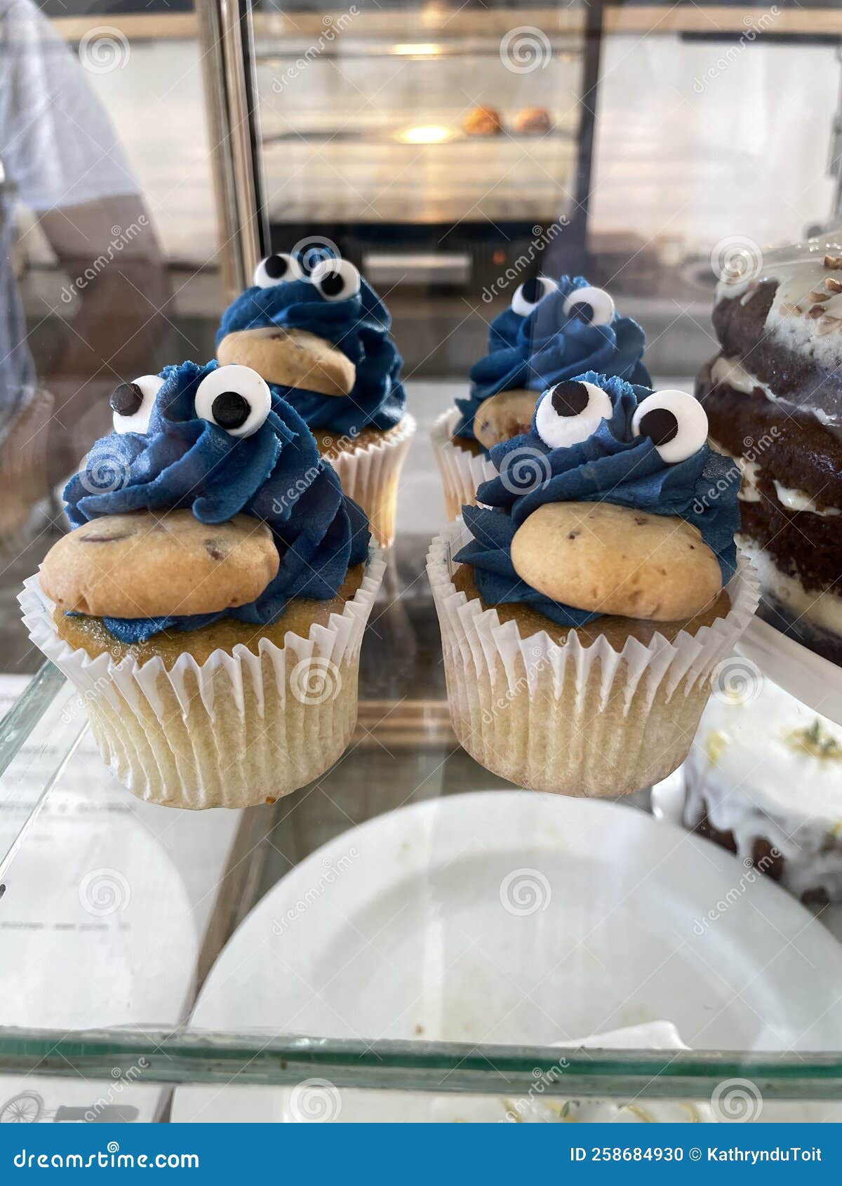 Blue Cookie Monster Cupcakes in a Bakery Stock Photo Image of dessert