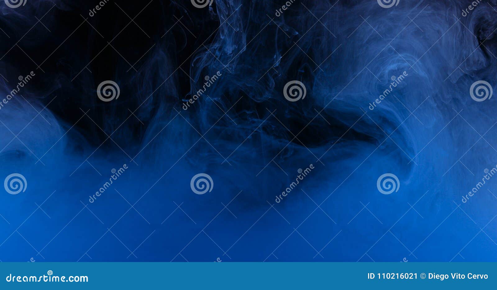 blue ink colors in water creating liquid art s