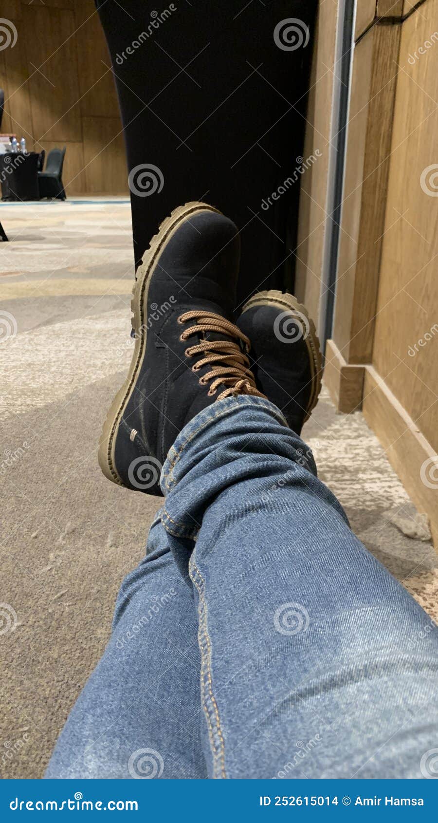 Blue jeans and black boots stock photo. Image of rest 252615014