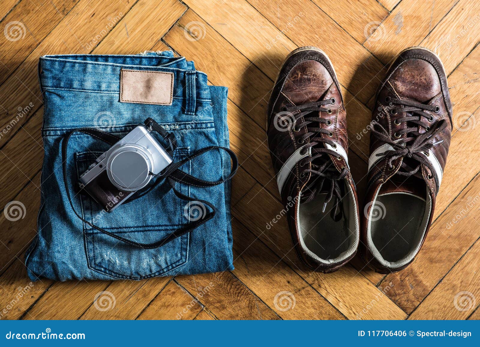 Blue Jeans, Brown Shoes, and a Camera Stock Photo - Image of home ...