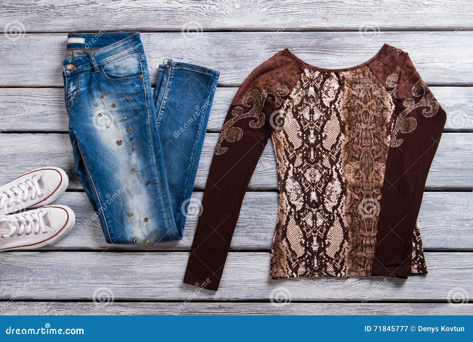 Blue jeans and brown top. stock image. Image of brown - 71845777