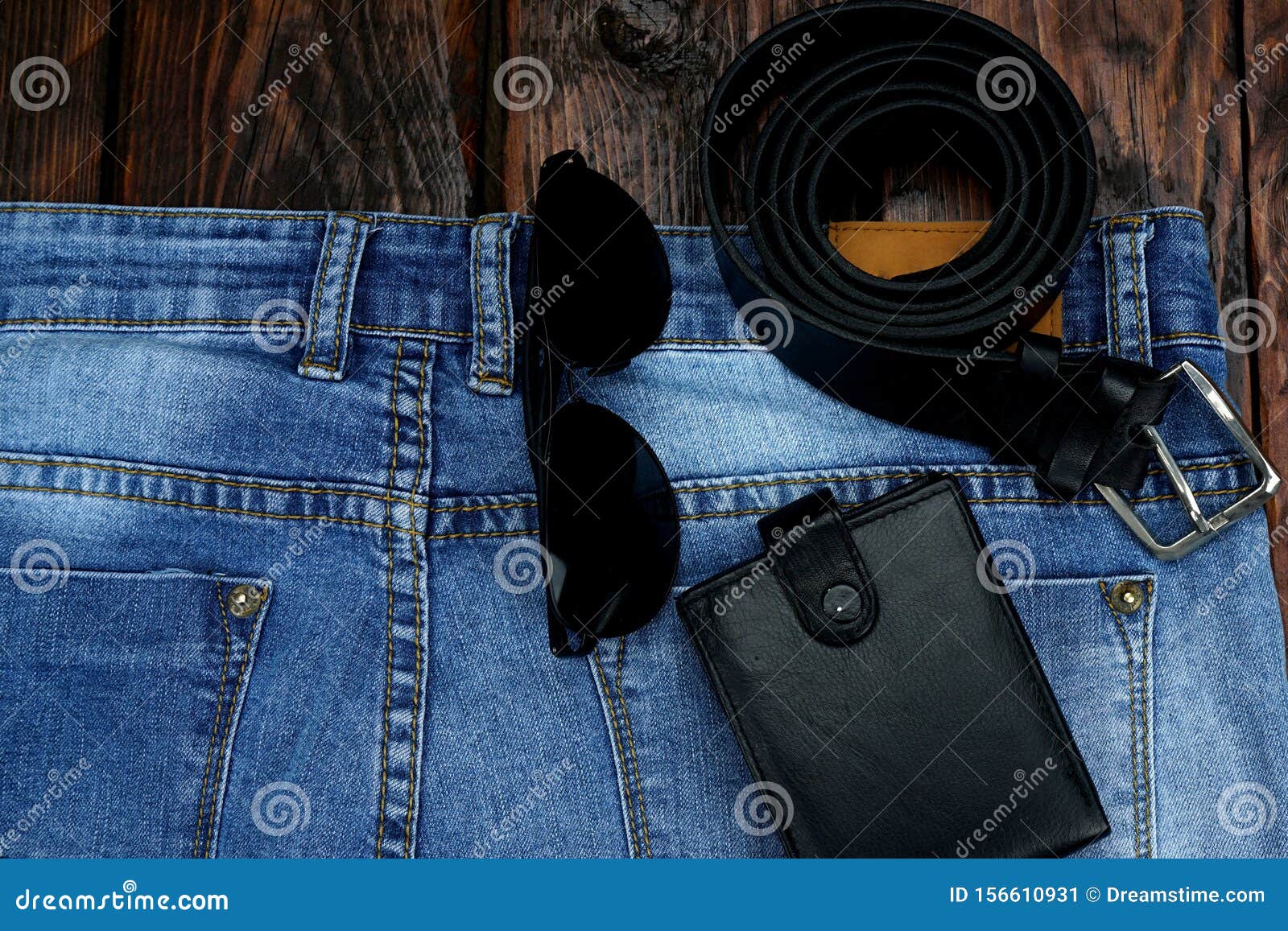 Blue Jeans on a Rough, Wooden Table. Stock Image - Image of view ...