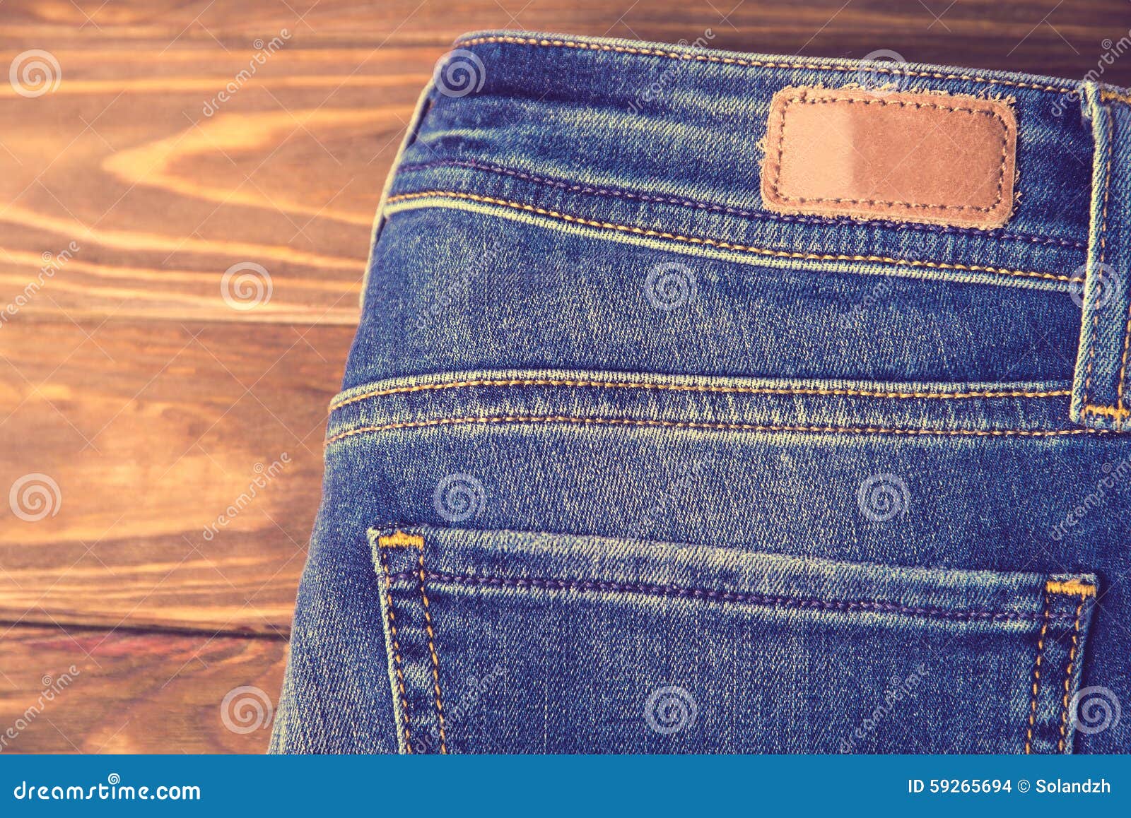 Blue Jeans with Half of Back Pocket and Brown Leather Tag Stock Photo ...