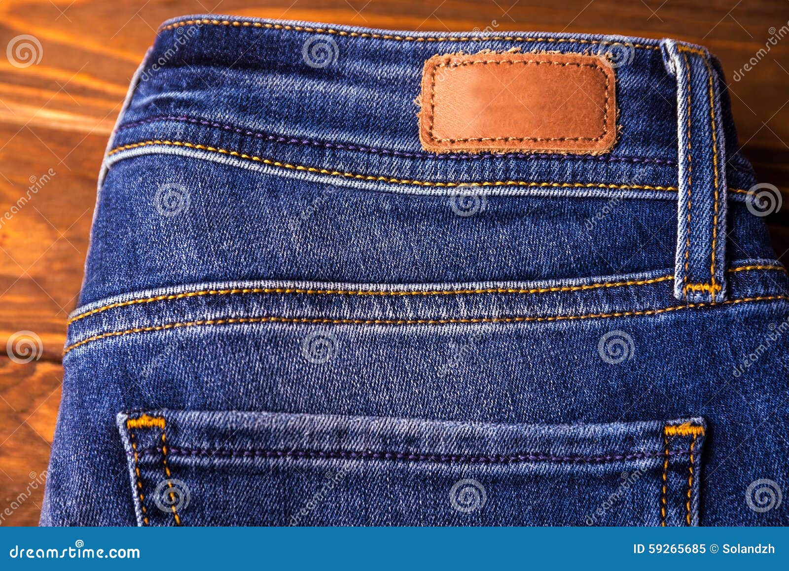 Blue Jeans With Half Of Back Pocket And Brown Leather Tag Stock Image ...