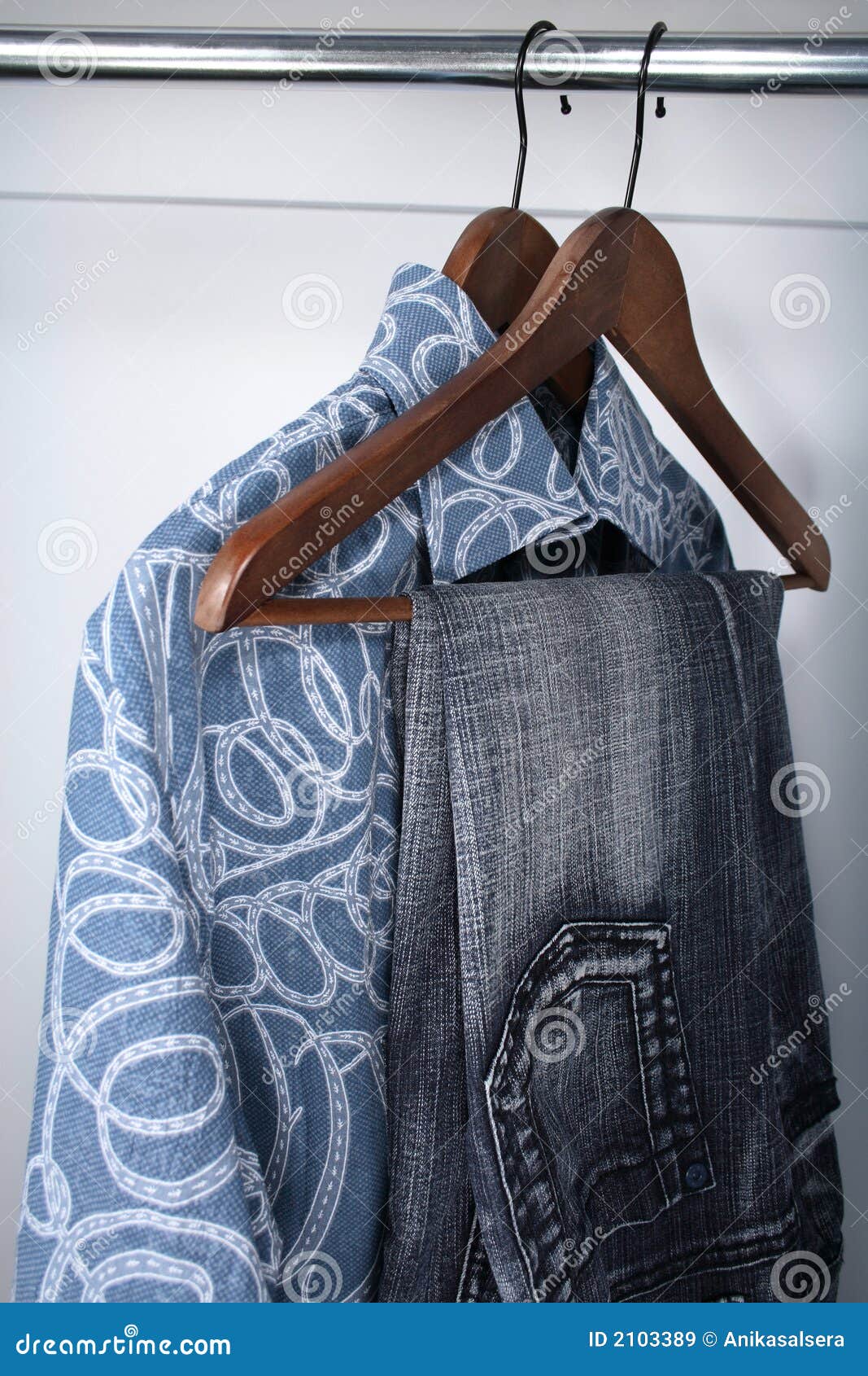 Wooden Hangers With Numbers In Dark Empty Cloakroom Or Checkroom Or