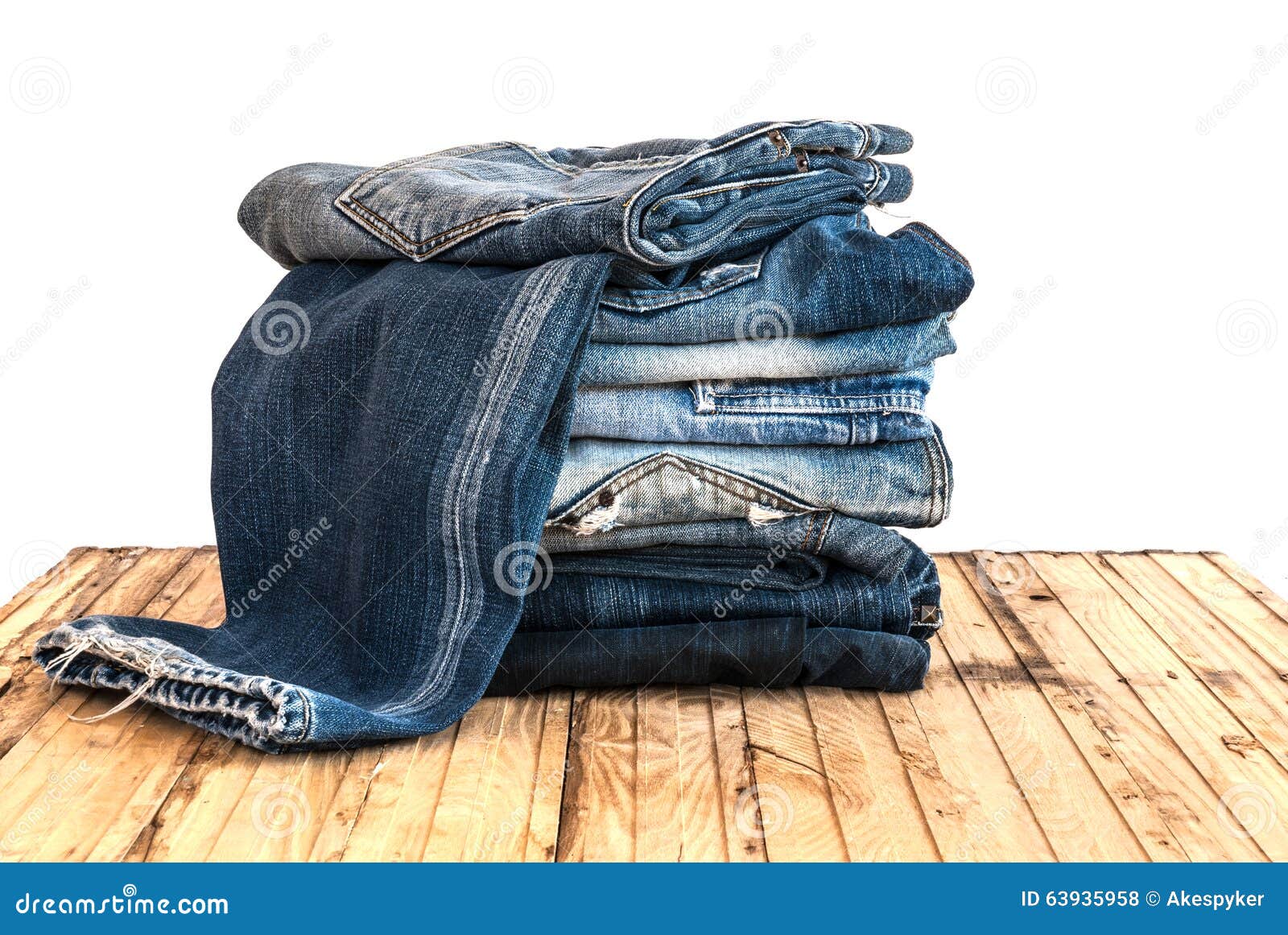 Blue Jeans Trouser Roll Up Isolated on the Wood Stock Photo - Image of ...