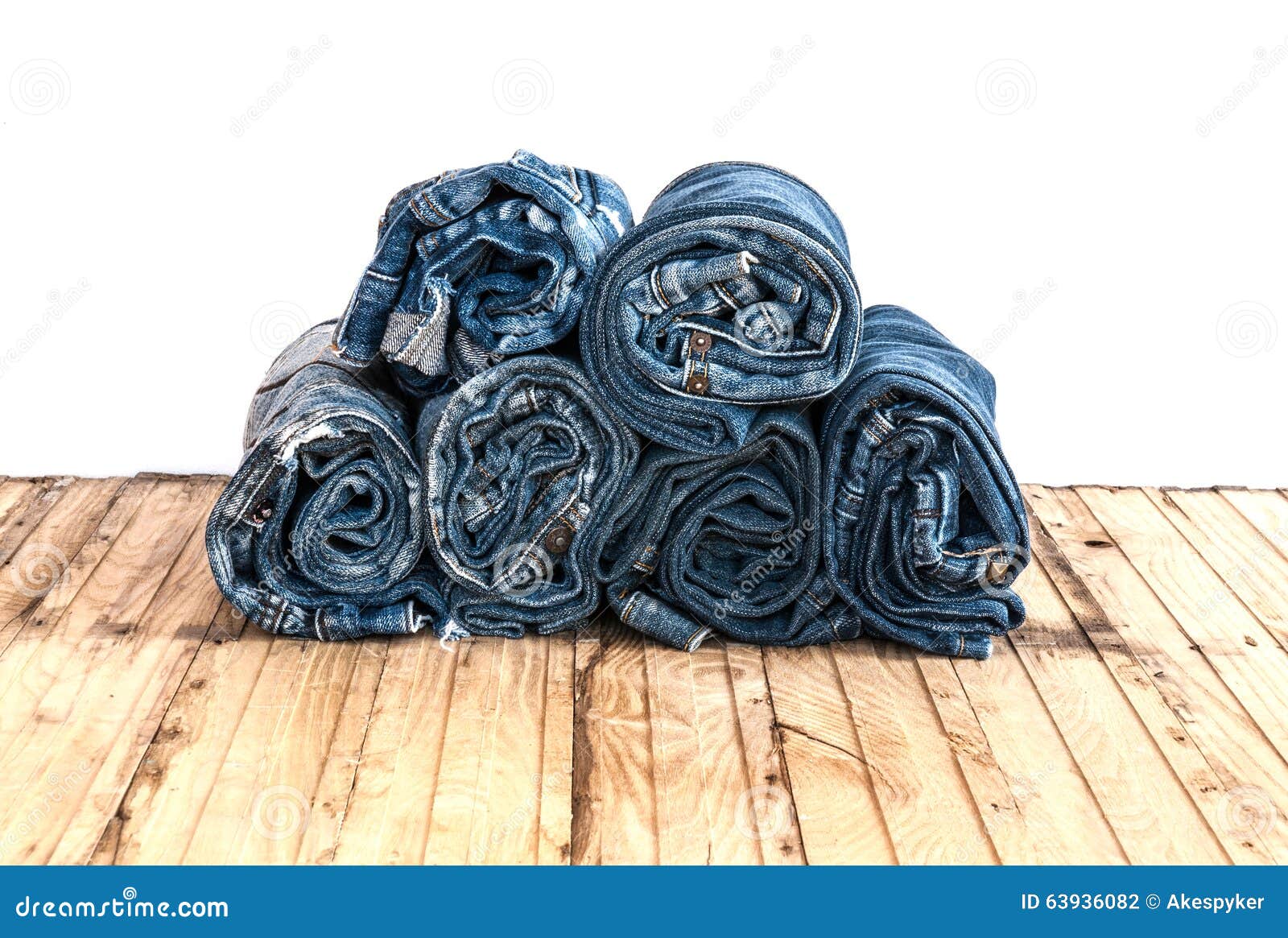 Blue Jeans Trouser Roll Up Isolated on the Wood Stock Photo - Image of ...