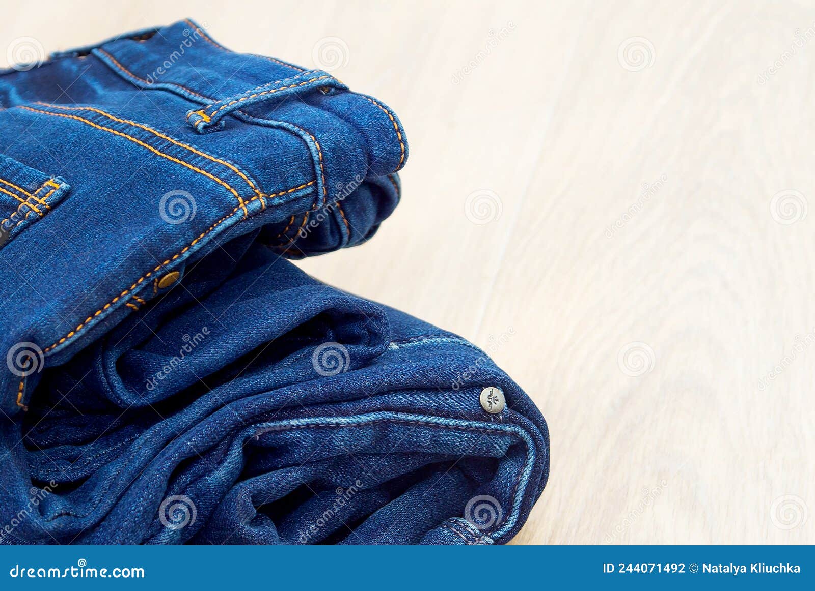 Blue Jeans on a White Background. Lots of Jeans. Denim Close-up ...