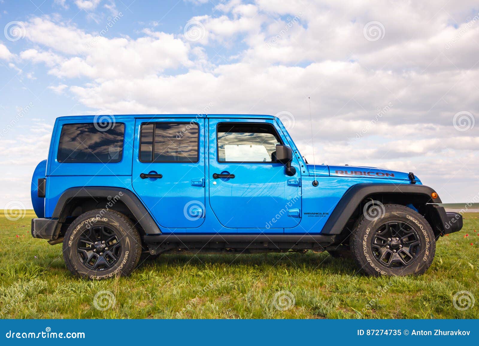 Blue Jeep Wrangler Rubicon Unlimited in Wild Tulip Field Near Saltwater  Reservoir Lake Manych-Gudilo Editorial Image - Image of metal, beautiful:  87274735