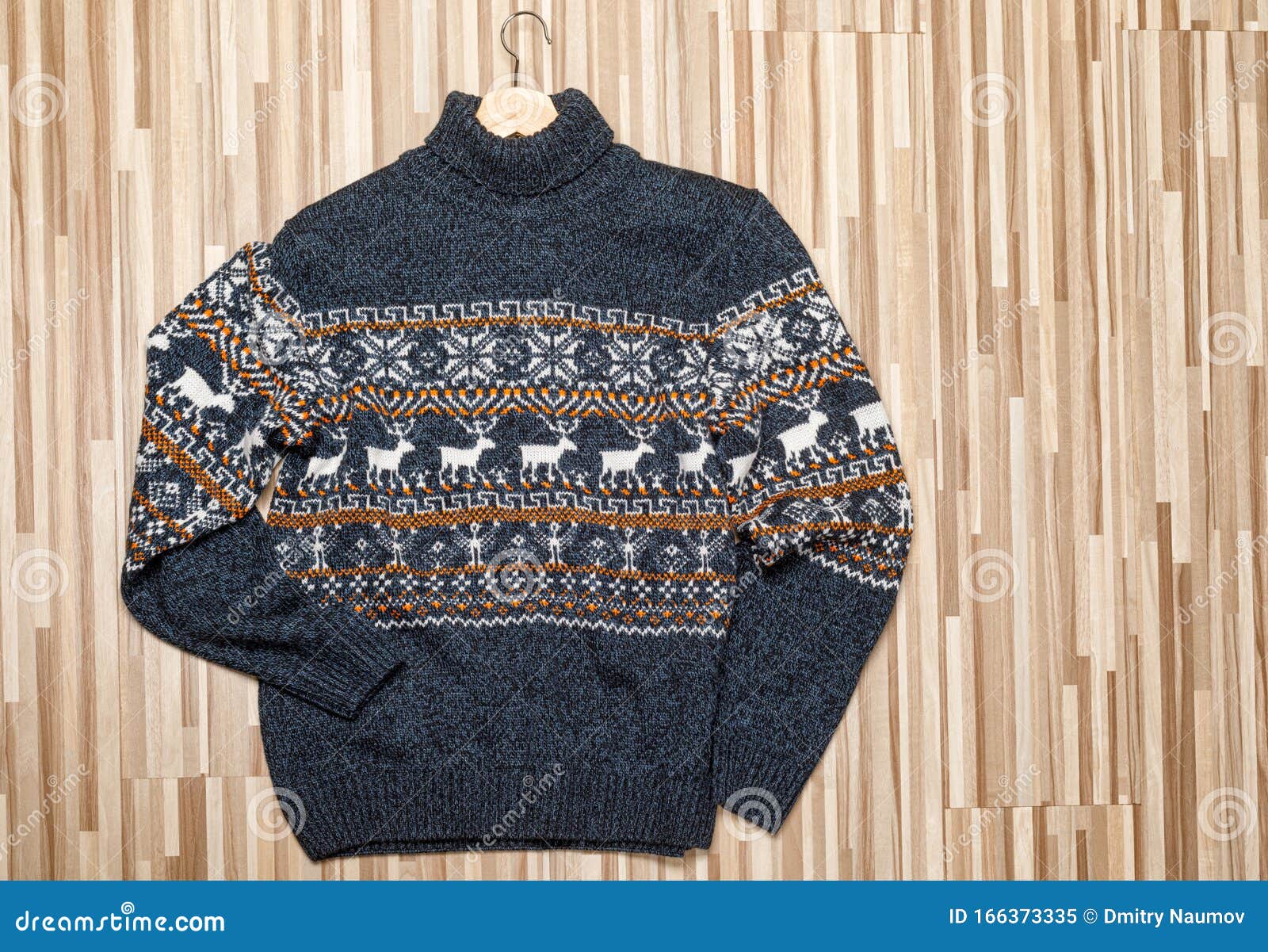 Blue Knitted Christmas Turtleneck Sweater with Nordic Ornament Lay on ...