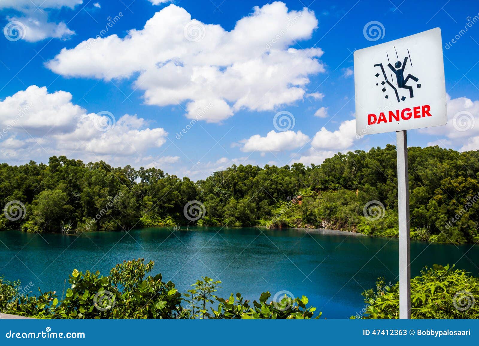 danger warning sign at blue lagoon. pulau ubin, singapore.