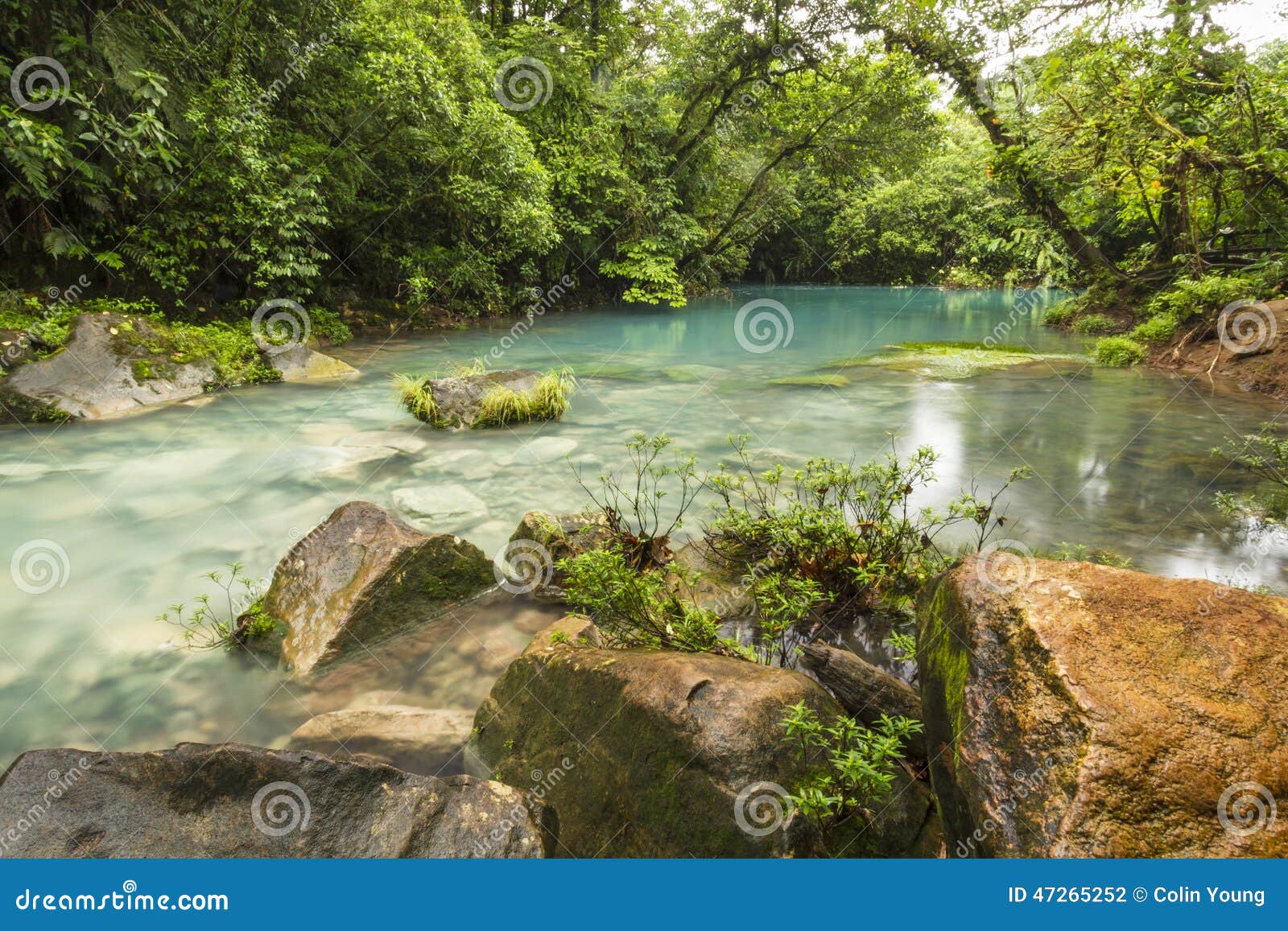 blue lagoon and orange rock