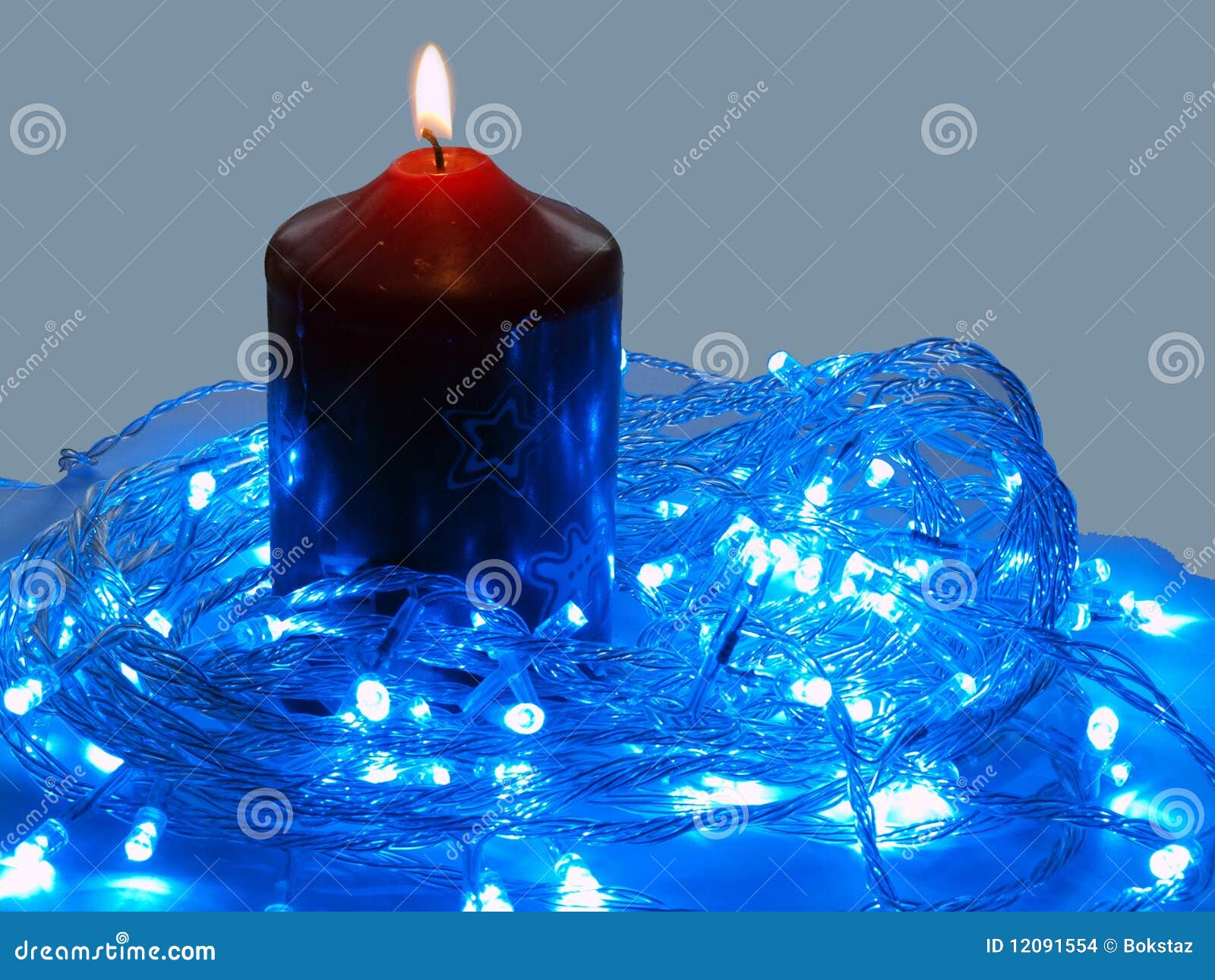 Blue LED and the candle stock photo. Image of celebration 12091554