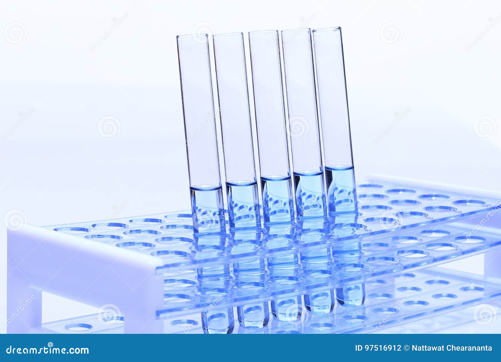Blue Liquid in Glass Tube Lab Test Tools on Plastic Stand Holder Stock