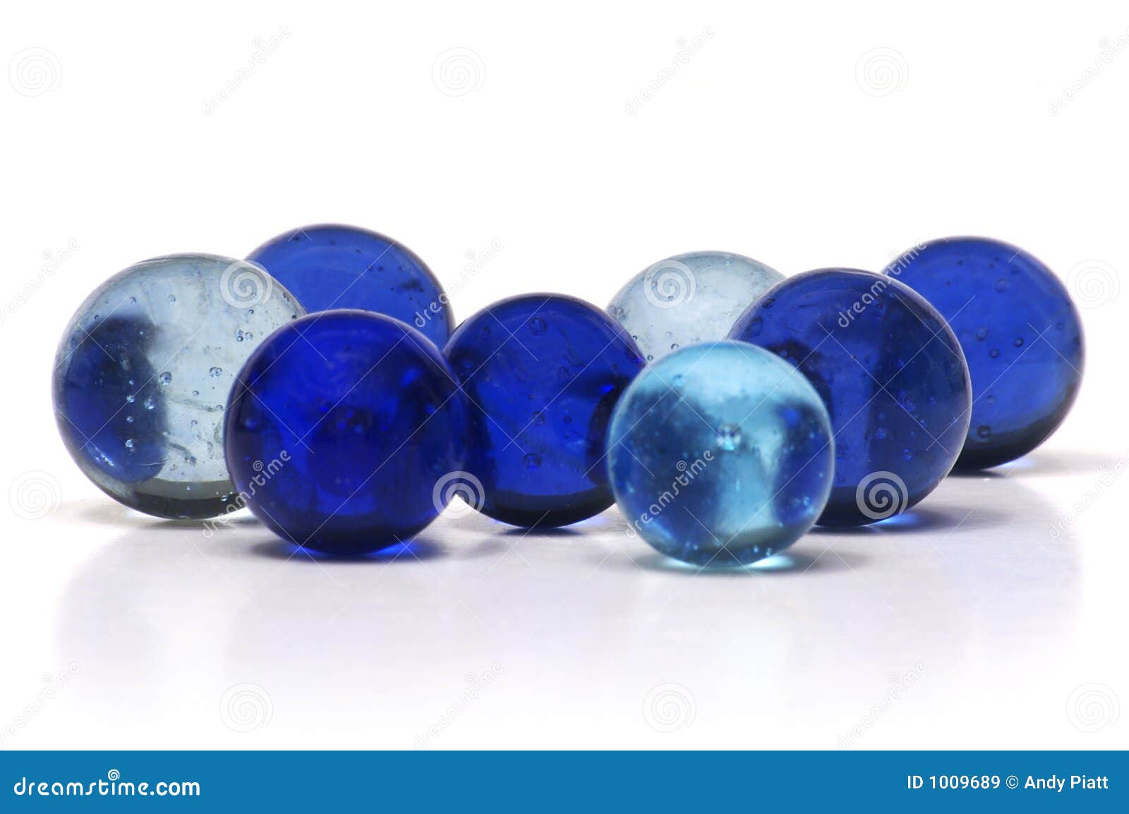 Blue Marbles stock image. Image of lose, playing, glass 1009689