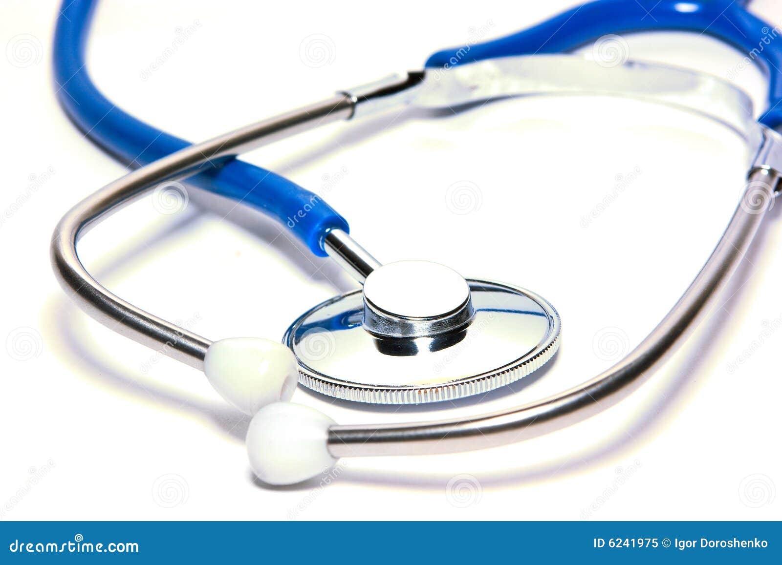 blue medical stetoscope  over white