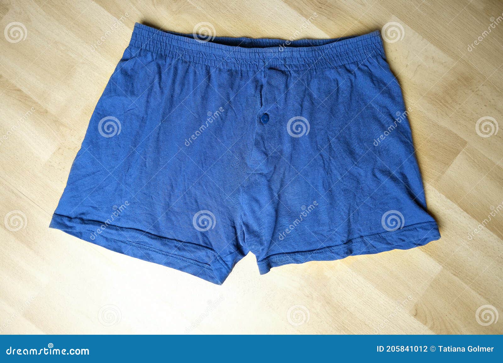 Blue Men`s Underpants Lying on the Floor, Knitted Underwear