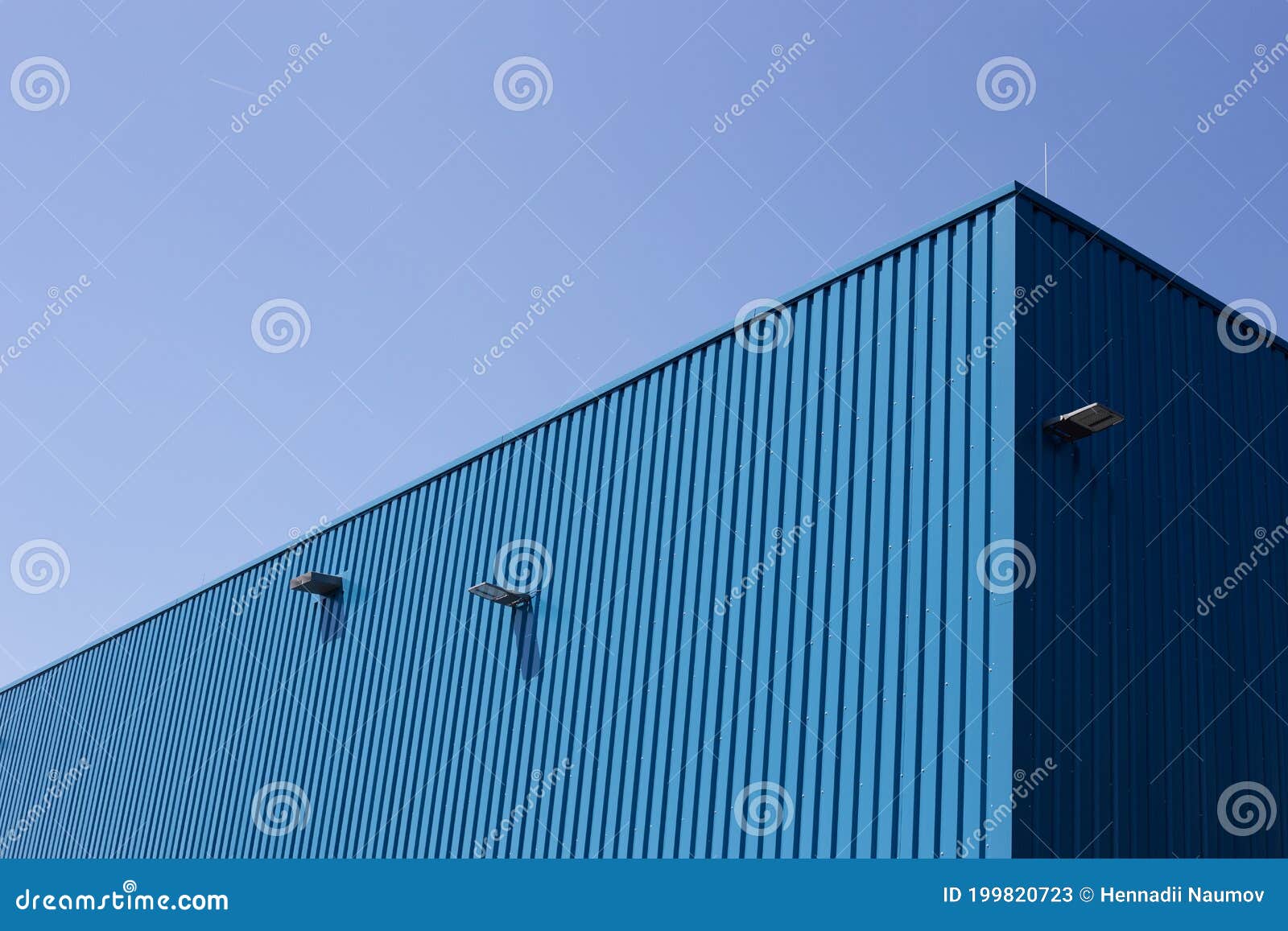 Blue Metal Building on Sky Background Stock Image - Image of wall