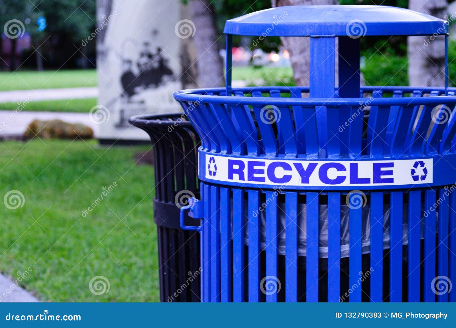 Blue Metal Recycling Bin in a Park Stock Image Image of container